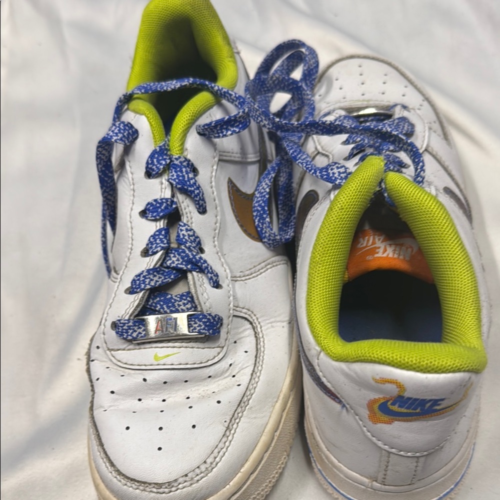 Nike Kids White Sneakers with Blue and Green Accents